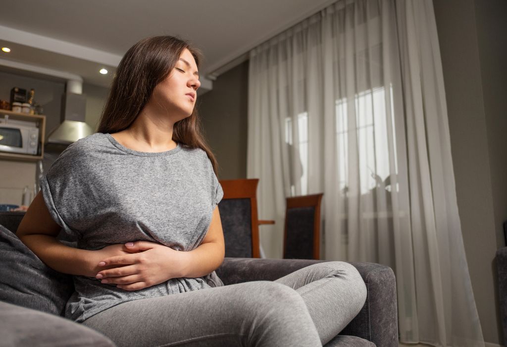 A woman experiencing gallbladder pain